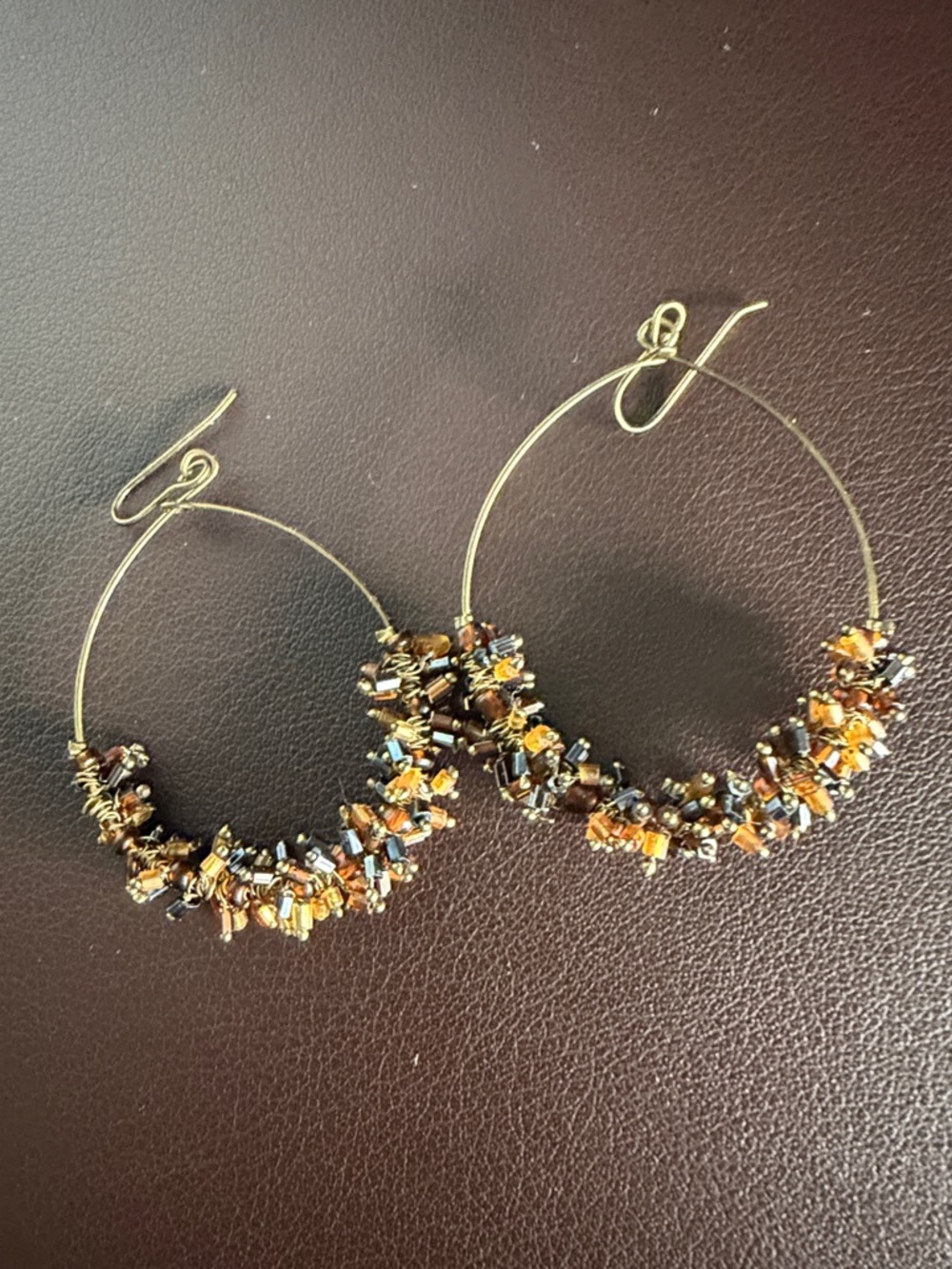 Handcrafted Gold Hoop Earrings with Amber and Black Beads